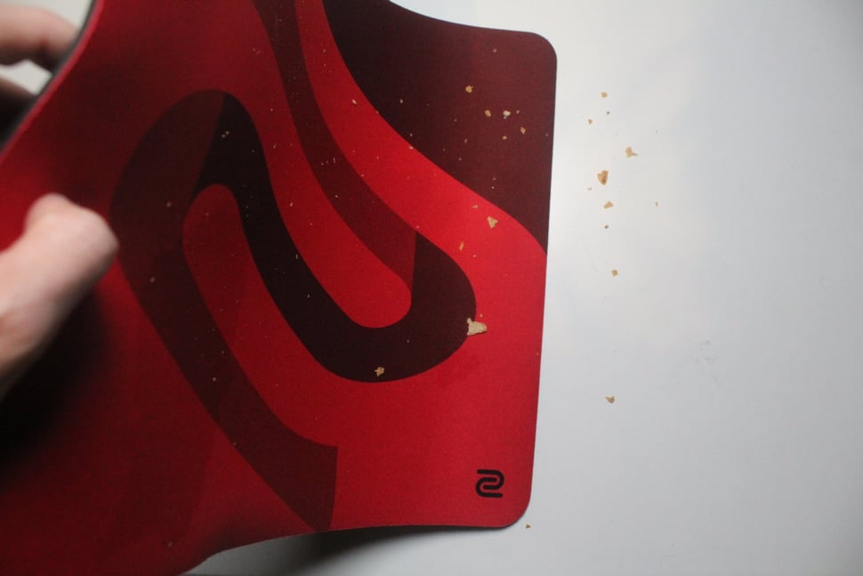 How to clean a mousepad guide - shake off the crumbs